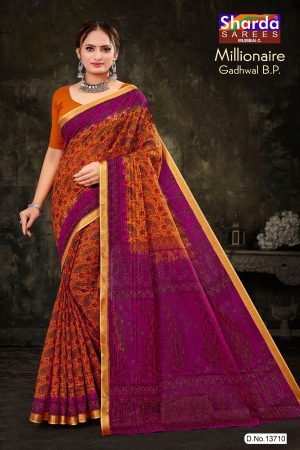 Millionaire Gadhwal cotton saree in orange and purple with gorgeous design