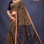 Model Wearing Gadhwal Mehndi & Navy Blue Floral Cotton Saree