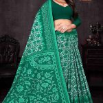 Model Draping Cute Choice Green Cotton Saree.