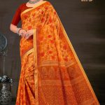 Model Wearing Gadhwal Orange Flower Design Saree