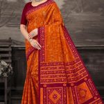 Pencil Guruji Orange Cotton Saree draped beautifully