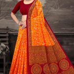 Model wearing Pencil Guruji Red Cotton Saree with orange accents