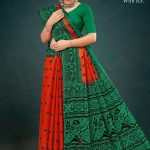 Green and red season varli cotton saree with animal design