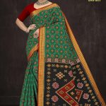 Paro Patola Border cotton saree in peacock green and dark red with bandhani pattern design