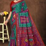 Non Stop Siroski cotton saree in peacock green and magenta blue with accent design