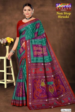 Non Stop Siroski cotton saree in peacock green and magenta blue with accent design