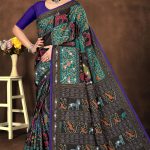 Non Stop Siroski cotton saree in peacock green and black with accent design