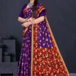 Sizzling Gold cotton saree in dark metal blue and dark red with floral and leaves design