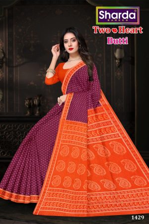 Two Heart Butti magenta and orange cotton saree with a simple dotted design.