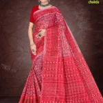 Celebrate culture in colour with the Florence Varli Chokda saree in striking vermillion red. Showcasing intricate Warli tribal motifs across the body and a Bandhani chokda-inspired pallu,