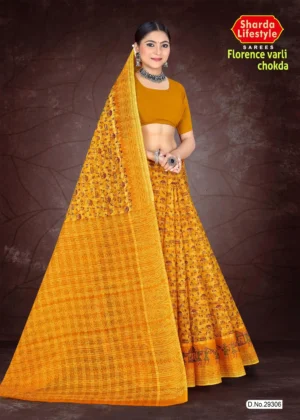 Woman wearing a mustard yellow Florence Varli Chokda saree featuring traditional Warli tribal motifs and Bandhani chokda patterns, styled with silver jewelry