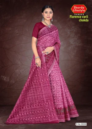 Woman wearing a deep pink Florence Varli Chokda saree by Sharda Lifestyle, featuring intricate traditional prints, a richly detailed pallu, and matching blouse, styled with silver jewelry against a brown textured backdrop.