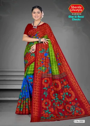 Woman wearing a vibrant Ghar ki Rasoi Checks saree by Sharda Lifestyle in red, green, and blue with bold floral and circular motifs, styled with traditional jewelry.
