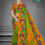 Model draped in Ghar ki Rasoi Checks green and orange floral printed saree by Sharda Lifestyle with subtle check patterns