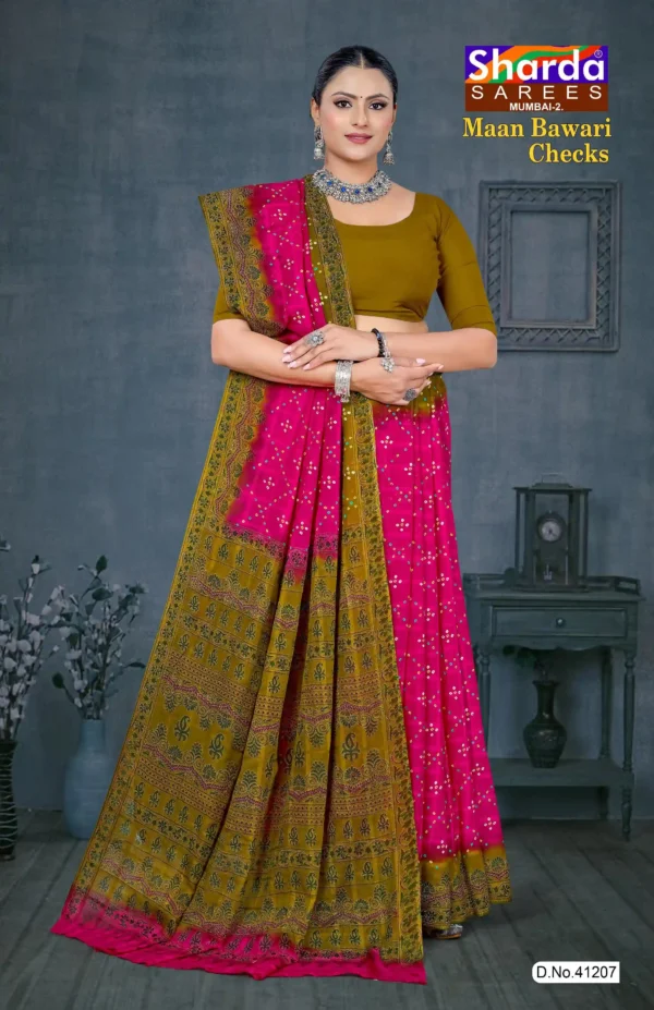 Woman in pink and mehendi green Maan Bawari Checks saree with dotted bandhani pattern and traditional printed border