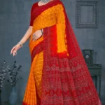 Model wearing yellow and red Maan Bawari Checks saree with Bandhej dots and rich ethnic print in cotton silk