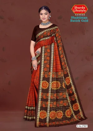 Model in Sharda brown batick silk saree with maroon base, golden zari and floral motif detailing