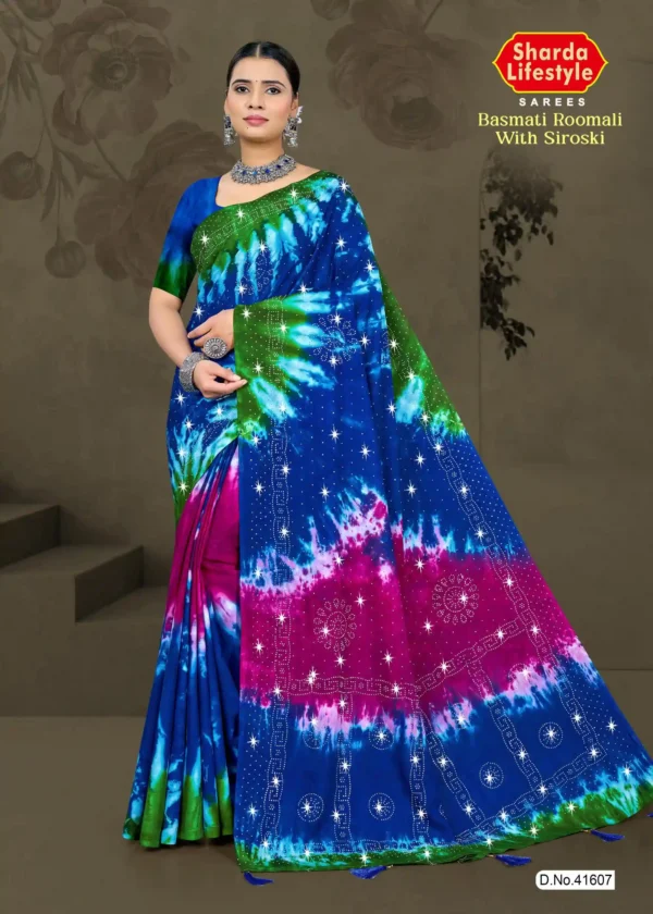 Basmati Roomali With Siroski saree in celestial blue bloom color with shimmering Siroski stone detailing and lightweight elegant fabric from Sharda Sarees.