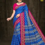 Noir Ruby saree by Sharda Sarees featuring black silk base with ruby red motifs and border design, ideal for festive and wedding occasions.