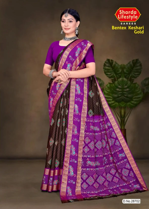 Regal Threads of Plum & Cocoa silk saree from Sharda Sarees featuring elegant traditional design in plum purple and cocoa brown for festive occasions.