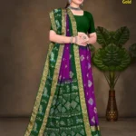 Experience regal charm with Bentex Keshari Gold – a vibrant emerald saree with rich gold detailing. Shop luxury sarees at Sharda Sarees.