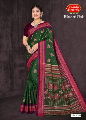 Deep green saree with red Kath embroidery – Regal Bikaneri Elegance by Sharda Sarees.