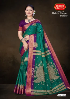 Model wearing teal green Hybrid Copper Border saree with purple contrast blouse and twin peacock antique copper zari pallu