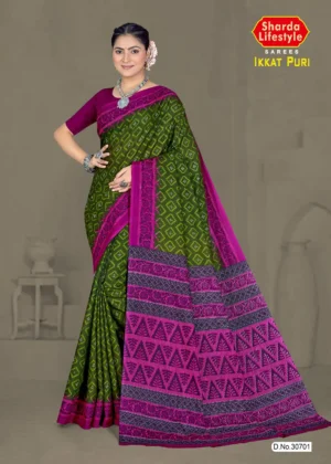 Woman wearing Ikkat Puri saree in moss green and magenta with ikkat weave and tribal patterned pallu