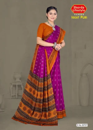 Orange and magenta Ikkat Puri saree with tribal woven motifs from Sharda Sarees – festive ethnic wear