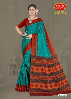 Discover the Ikkat Puri Teal & Rust Saree with bold tribal motifs. Perfect for festive and traditional occasions. Shop this handloom saree online now.