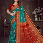 Model wearing Israel Gold saree with teal green base, golden motifs, and maroon zari pallu, perfect for weddings and festivals