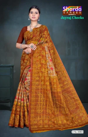 Model wearing copper brown Jayraj Checks saree with golden leaf pallu and multicolor floral printed body from Sharda Sarees