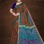 Model wearing a chocolate brown saree with an aqua and purple patola pallu from Sharda Lifestyle Singapore Gold – Design No. 30209