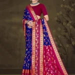 Model draped in blue and pink floral silk saree with golden zari border from Sizzling Sona by Sharda