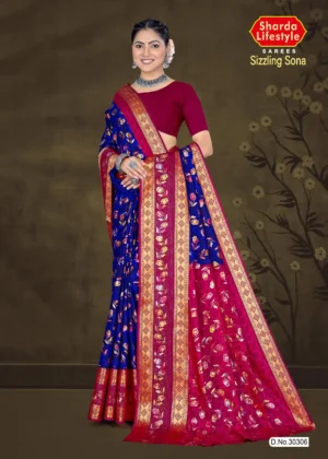 Model draped in blue and pink floral silk saree with golden zari border from Sizzling Sona by Sharda