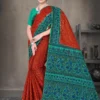 Rust orange and green Sone Pe Shuhaga saree with intricate blue floral weave from Sharda Sarees