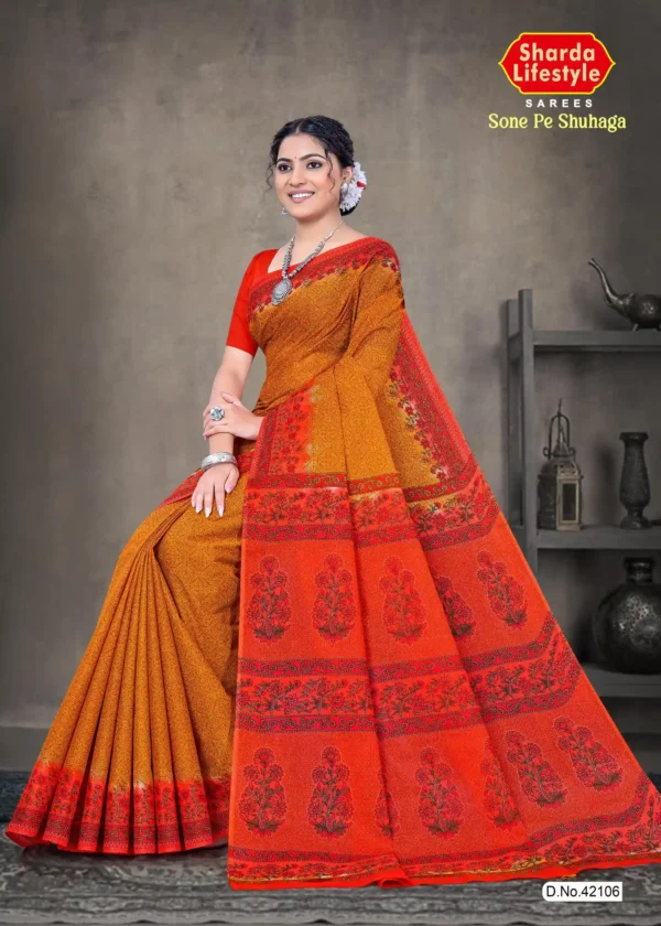 Mustard yellow and red Sone Pe Shuhaga saree with intricate floral border from Sharda Sarees