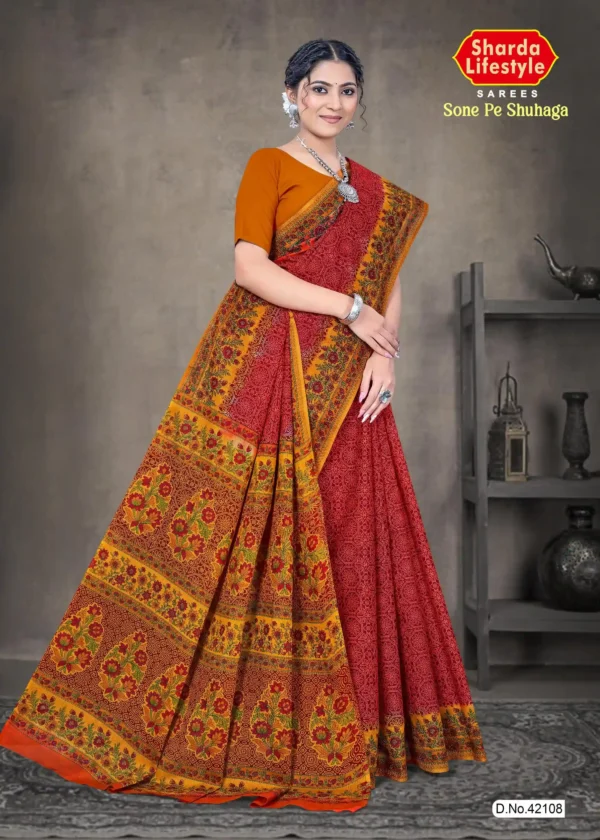 Rust red and mustard yellow Sone Pe Shuhaga saree with intricate floral border from Sharda Sarees